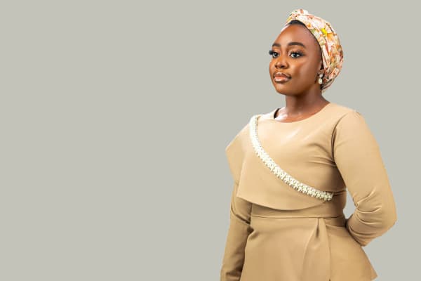 Beige modest work-wear silhouette